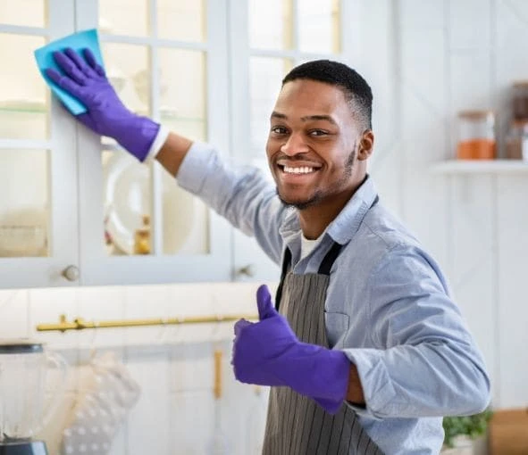 Indigo Cleaning team servicing a hotel hallway
